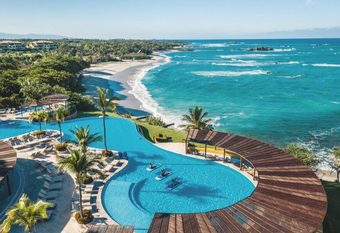 Four Seasons Resort Punta Mita aerial view. Gay-friendly hotel with pools, beach, and ocean. Ideal gay travel destination.