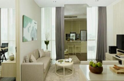Fraser Residence Menteng Jakarta interior. Gay-friendly hotel living room with kitchen. Jakarta hotel for gay men travel.