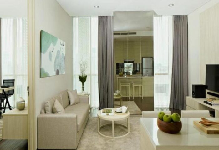Fraser Residence Menteng Jakarta interior. Gay-friendly hotel living room with kitchen. Jakarta hotel for gay men travel.