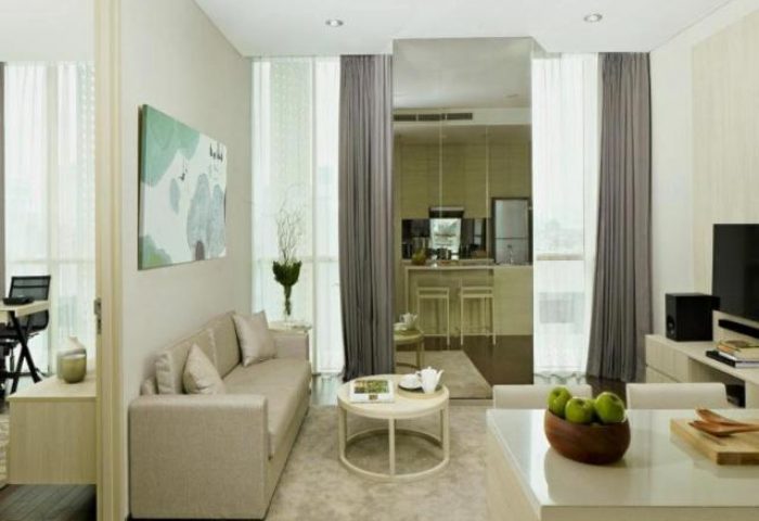Fraser Residence Menteng Jakarta interior. Gay-friendly hotel living room with kitchen. Jakarta hotel for gay men travel.