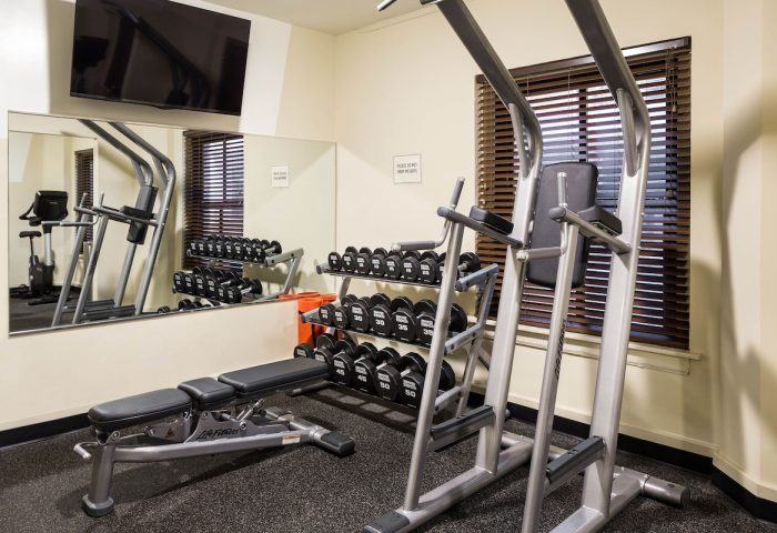 Freehand Chicago gay-friendly hotel gym. Weight rack, bench, pull-up station, and TV. A great place to workout while traveling.