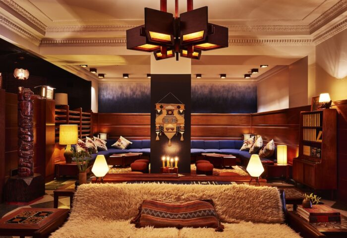 Freehand Chicago's gay-friendly hotel interior. Lounge area with plush seating, unique lighting, and stylish decor. A welcoming space for LGBT travelers.