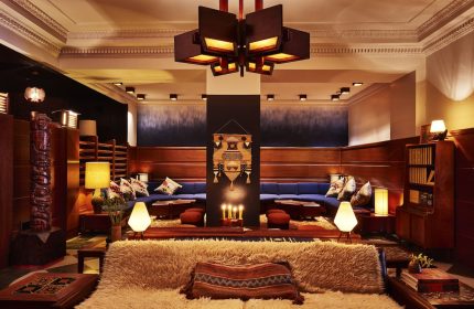 Freehand Chicago's gay-friendly hotel interior. Lounge area with plush seating, unique lighting, and stylish decor. A welcoming space for LGBT travelers.