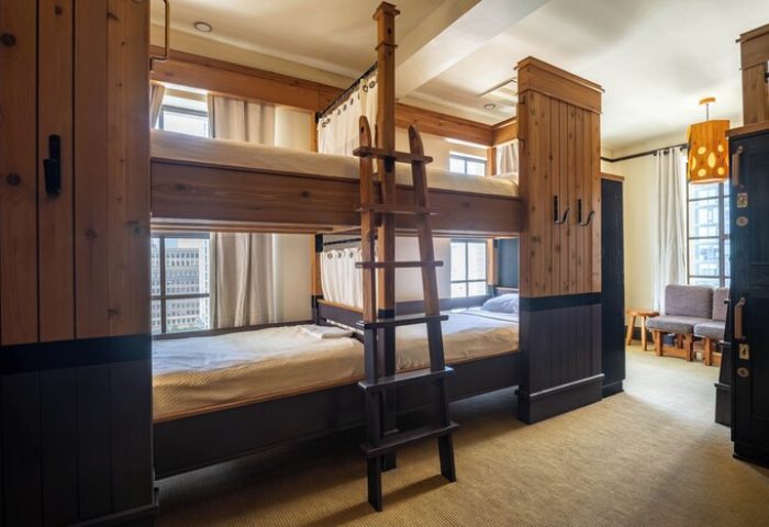 Freehand Los Angeles gay-friendly hotel room with bunk beds, ladder, curtains, and city views. A great choice for gay travel to Los Angeles.
