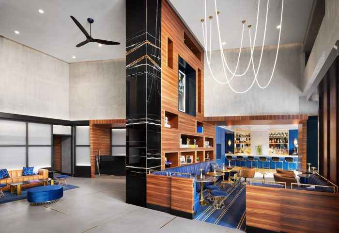 Gansevoort Meatpacking NYC hotel lobby and bar. Gay-friendly hotel with modern design, stylish seating, and a well-stocked bar.