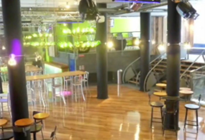 Generator Hostel Dublin's gay-friendly interior. Bar area, club lighting, and seating. A top choice for gay travelers' Dublin reviews.