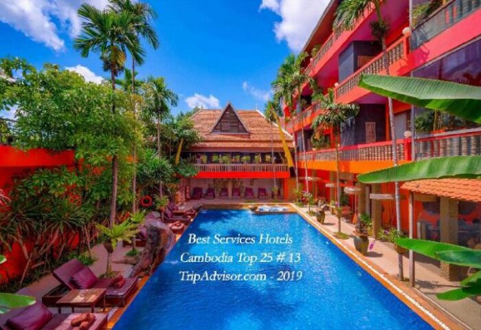Golden Temple Hotel pool view. Gay-friendly hotel in Cambodia offers a relaxing retreat with lush greenery and vibrant architecture.