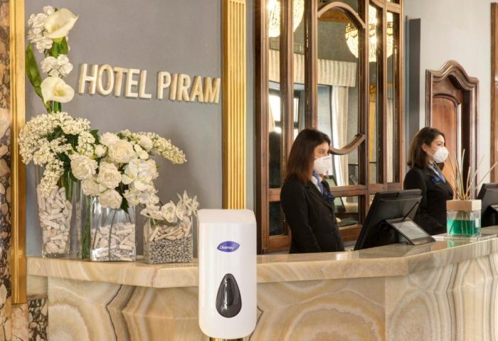 Hotel Piram Rome reception. Staff at the reception desk of this gay-friendly hotel in Rome. The hotel is near Termini station.