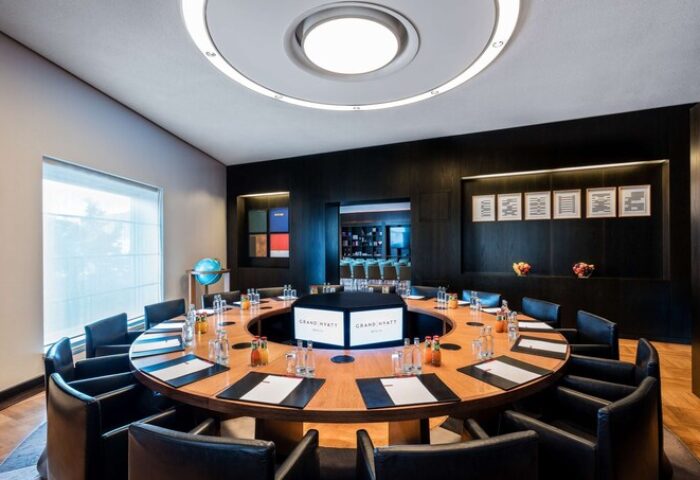 Grand Hyatt Berlin's round table conference room. This gay-friendly hotel offers modern spaces for meetings and events in Berlin, Germany.