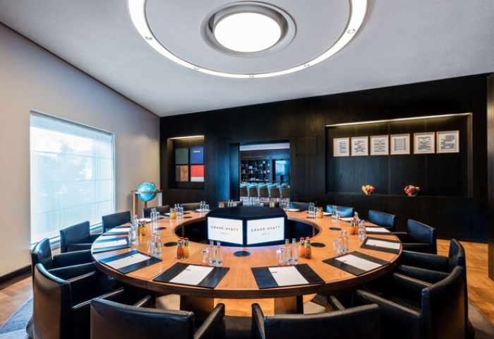 Grand Hyatt Berlin's round table conference room. This gay-friendly hotel offers modern spaces for meetings and events in Berlin, Germany.