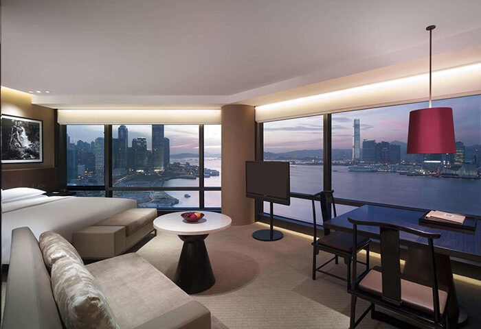 Grand Hyatt Hong Kong gay-friendly hotel room with city view. Luxury suite with modern design, perfect for gay travelers' Hong Kong vacation.