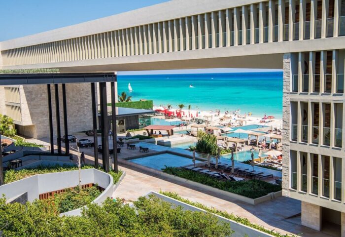 Grand Hyatt Playa Del Carmen Resort view. Gay-friendly hotel with beach access, pools, and modern architecture. Ideal for gay travelers.