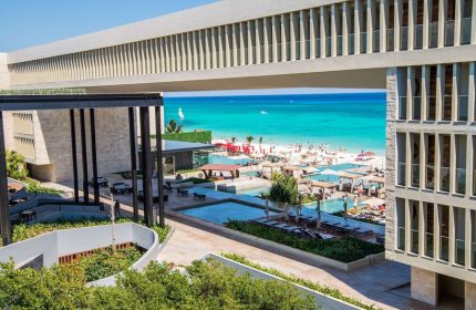 Grand Hyatt Playa Del Carmen Resort view. Gay-friendly hotel with beach access, pools, and modern architecture. Ideal for gay travelers.