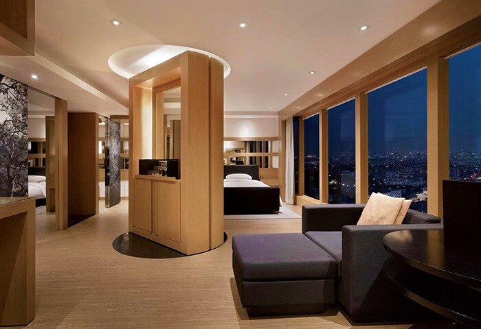 Grand Hyatt Seoul gay-friendly hotel room. Modern design with city view, seating area, and bed. Upscale gay travel accommodations in Seoul, South Korea.