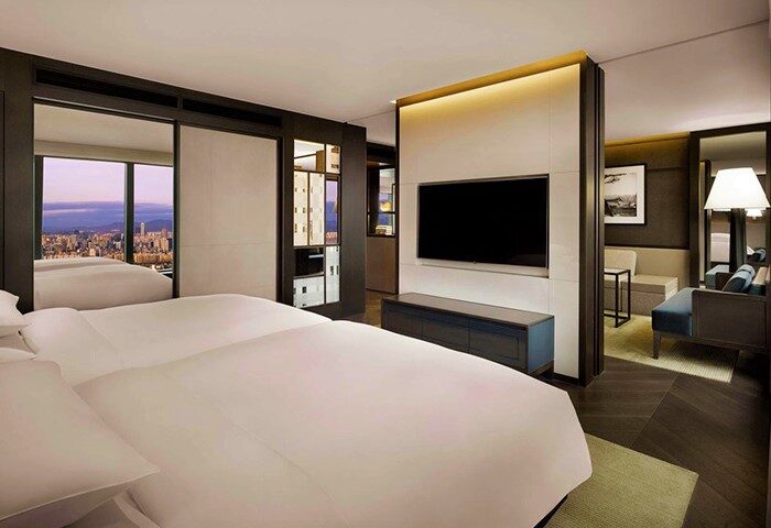 Grand Hyatt Seoul gay-friendly hotel room. Modern design, city view, large TV, comfortable seating. Perfect for gay travelers in Seoul.