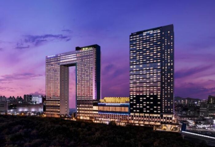 Grand Mercure Ambassador Hotel & Residences Seoul Yongsan at dusk. Gay-friendly hotel with modern architecture in Seoul, South Korea.