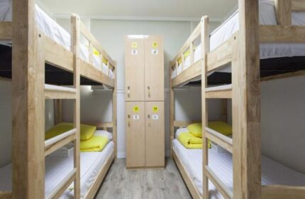 DODAMi Guest House: Bunk beds and lockers in a shared room. Gay-friendly hotel for gay men travelers. Simple, clean, and budget-friendly stay.