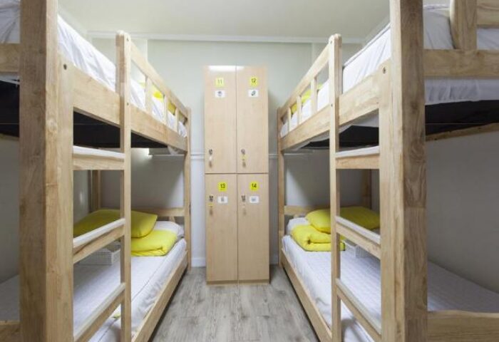 DODAMi Guest House: Bunk beds and lockers in a shared room. Gay-friendly hotel for gay men travelers. Simple, clean, and budget-friendly stay.