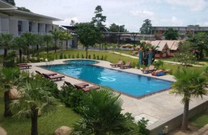 Gypsy Sea View Resort pool & grounds. This gay-friendly hotel offers a relaxing retreat with lush gardens & inviting pool. Perfect for gay travelers.