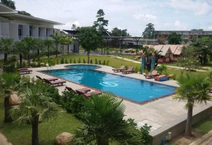 Gypsy Sea View Resort pool & grounds. This gay-friendly hotel offers a relaxing retreat with lush gardens & inviting pool. Perfect for gay travelers.