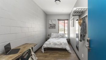 HI Los Angeles Santa Monica Hostel room. Gay-friendly hotel with bed, desk, & storage. Great for gay travel in Los Angeles.