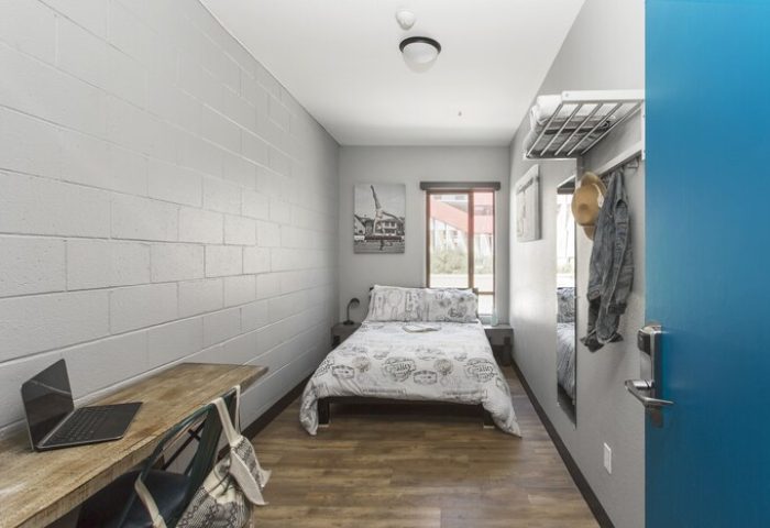 HI Los Angeles Santa Monica Hostel room. Gay-friendly hotel with bed, desk, & storage. Great for gay travel in Los Angeles.