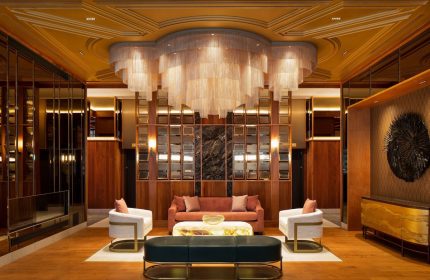 HONEYROSE Hotel Montreal lobby. A gay-friendly Tribute Portfolio Hotel with stylish seating, chandelier, and modern design. Upscale travel.