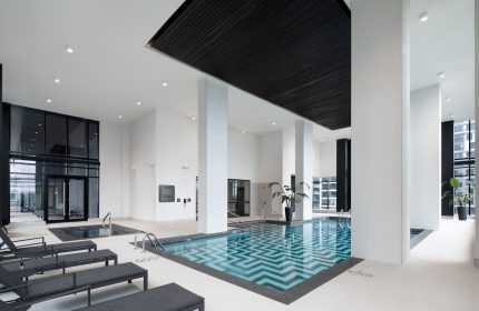 Indoor pool at HONEYROSE Hotel, Montreal, a Tribute Portfolio Hotel. This gay-friendly hotel offers a luxurious experience.