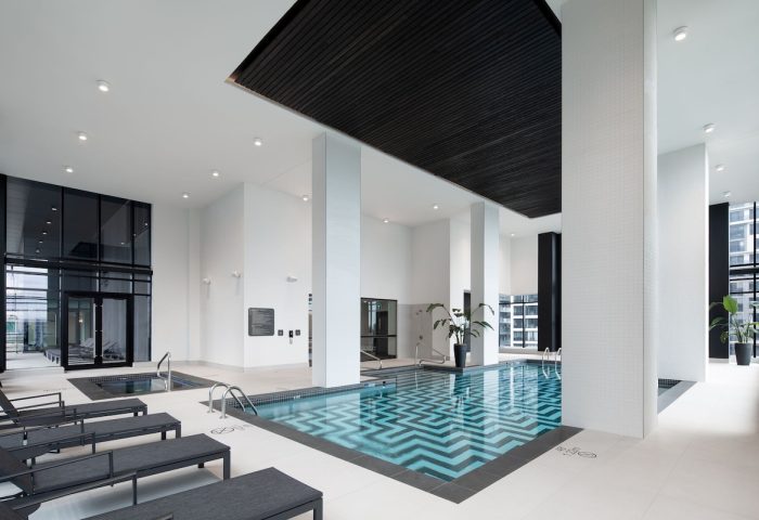 Indoor pool at HONEYROSE Hotel, Montreal, a Tribute Portfolio Hotel. This gay-friendly hotel offers a luxurious experience.