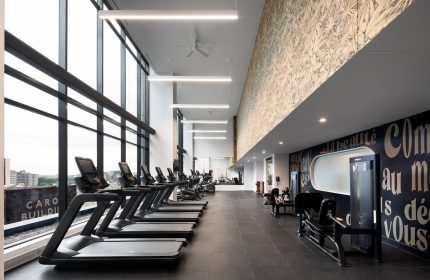 HONEYROSE Hotel Montreal gym with treadmills and weights. Gay-friendly hotel fitness center with city views. A Tribute Portfolio Hotel.