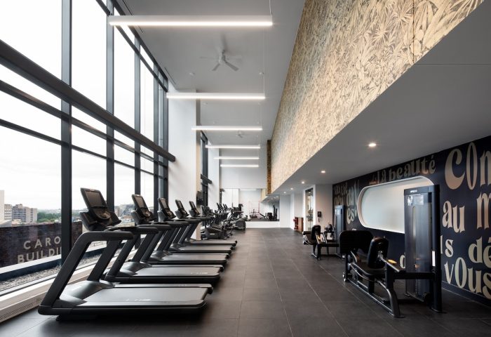 HONEYROSE Hotel Montreal gym with treadmills and weights. Gay-friendly hotel fitness center with city views. A Tribute Portfolio Hotel.