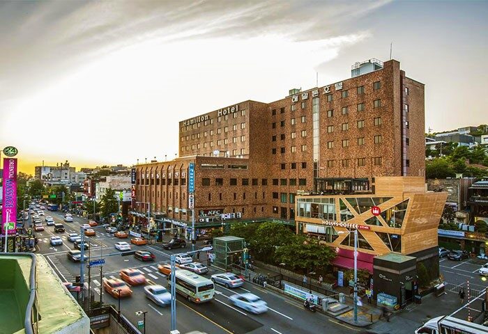 Hamilton Hotel Itaewon, a gay-friendly hotel in Seoul, South Korea. View of the hotel exterior and street scene. Popular choice for gay travelers.