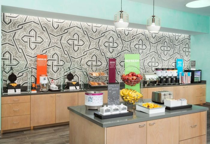 Breakfast bar at Hampton Inn & Suites Santa Monica, a gay-friendly hotel. Fresh fruit, waffles, and other options available.