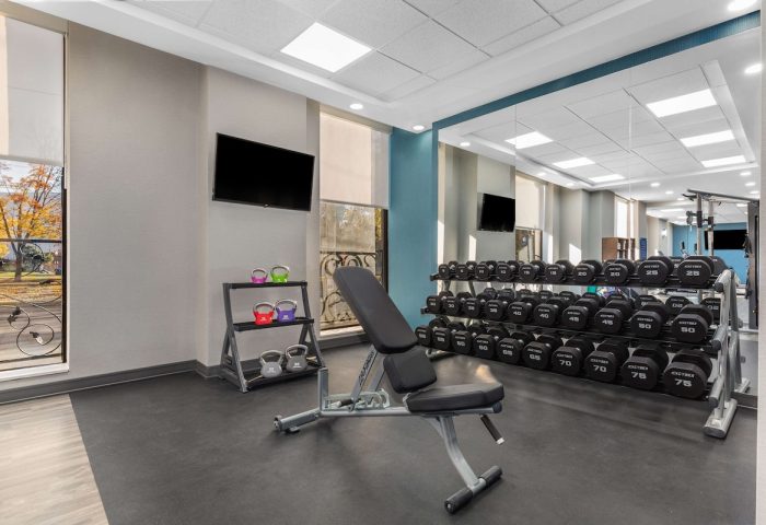Hampton Inn & Suites by Hilton Toronto Downtown gym. Weight rack, bench, kettlebells. Gay-friendly hotel for travelers.