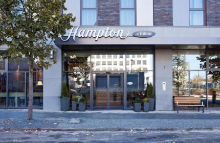 Hampton by Hilton Berlin City East Side Gallery entrance. A gay-friendly, pet-friendly hotel in Berlin, Germany. Modern architecture.