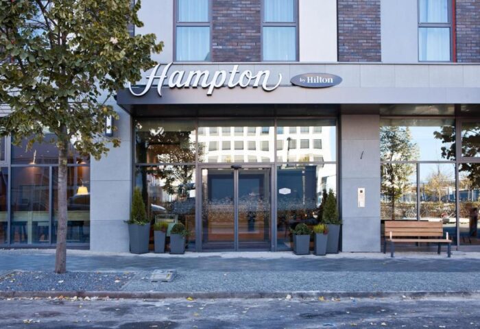 Hampton by Hilton Berlin City East Side Gallery entrance. A gay-friendly, pet-friendly hotel in Berlin, Germany. Modern architecture.