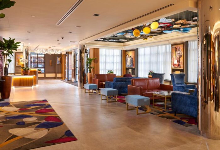 Hard Rock Hotel Dublin lobby. Gay-friendly hotel with stylish decor, colorful accents, and comfortable seating. A welcoming space for all travelers.