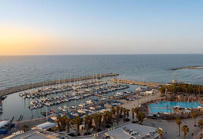 Herods Tel Aviv By The Beach view. Gay-friendly hotel overlooking the marina, beach, and pool. Perfect for gay travel in Tel Aviv.