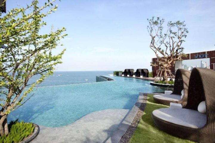 Hilton Pattaya's infinity pool overlooks the ocean. This gay-friendly hotel offers luxury and relaxation for gay travelers.