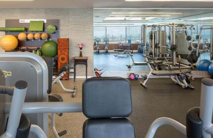 Hilton Tel Aviv's gym. This gay-friendly hotel features modern fitness equipment with a view. Ideal for gay men's travel and wellness.