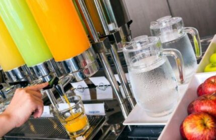 Holiday Inn Express Krabi Ao Nang Beach breakfast bar. Juices, water, & apples offer a refreshing start at this gay-friendly hotel.