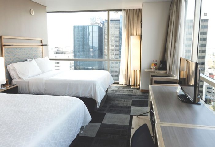 Holiday Inn Express Mexico Reforma room with two beds and city view. Gay-friendly hotel for gay men travelers in Mexico City.