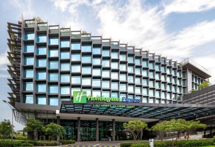 Holiday Inn Express Singapore Clarke Quay exterior. Gay-friendly hotel with SG Clean Certified. Modern architecture, blue sky.