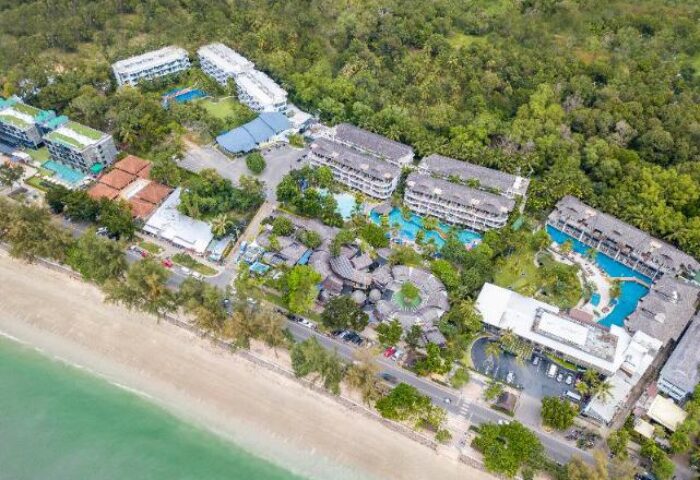 Holiday Inn Resort Krabi Ao Nang Beach aerial view. Gay-friendly hotel with pools, beach access, and lush tropical surroundings.