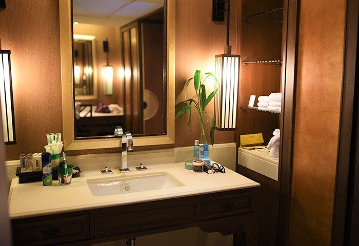 Bathroom at Holiday Inn Resort Phuket, a gay-friendly hotel. Sink, mirror, and toiletries offer comfort for gay travelers in Thailand.