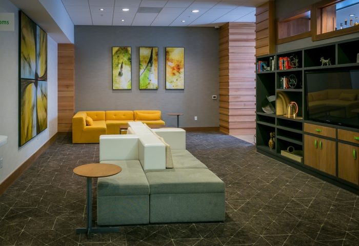 Holiday Inn San Francisco Golden Gateway lobby. Modern design, colorful art, comfortable seating. Gay-friendly hotel interior.
