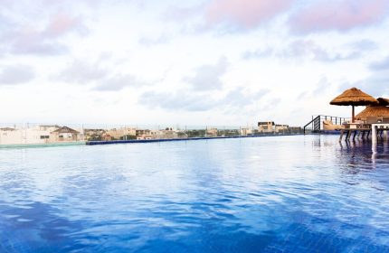 Hotel 52's rooftop pool, a gay-friendly hotel. Relaxing cabanas overlook the city. Perfect for gay travel and a welcoming stay.