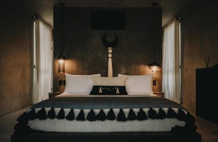 Hotel Bardo Adults Only room. Gay-friendly hotel bedroom with king bed, dark walls, minimal decor. Ideal for gay travel, romantic getaway.