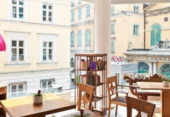 Hotel Beethoven Wien's interior view. Gay-friendly hotel with a library and wooden furniture. Vienna travel advice for gay men.