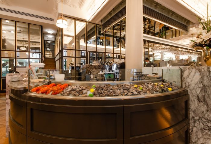 Hotel Birks Montreal's oyster bar. Fresh oysters and lobsters on display at this gay-friendly hotel. Fine dining experience in Montreal.